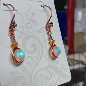 🎇 2 for $12 Beautiful handmade glowy dangle earrings!